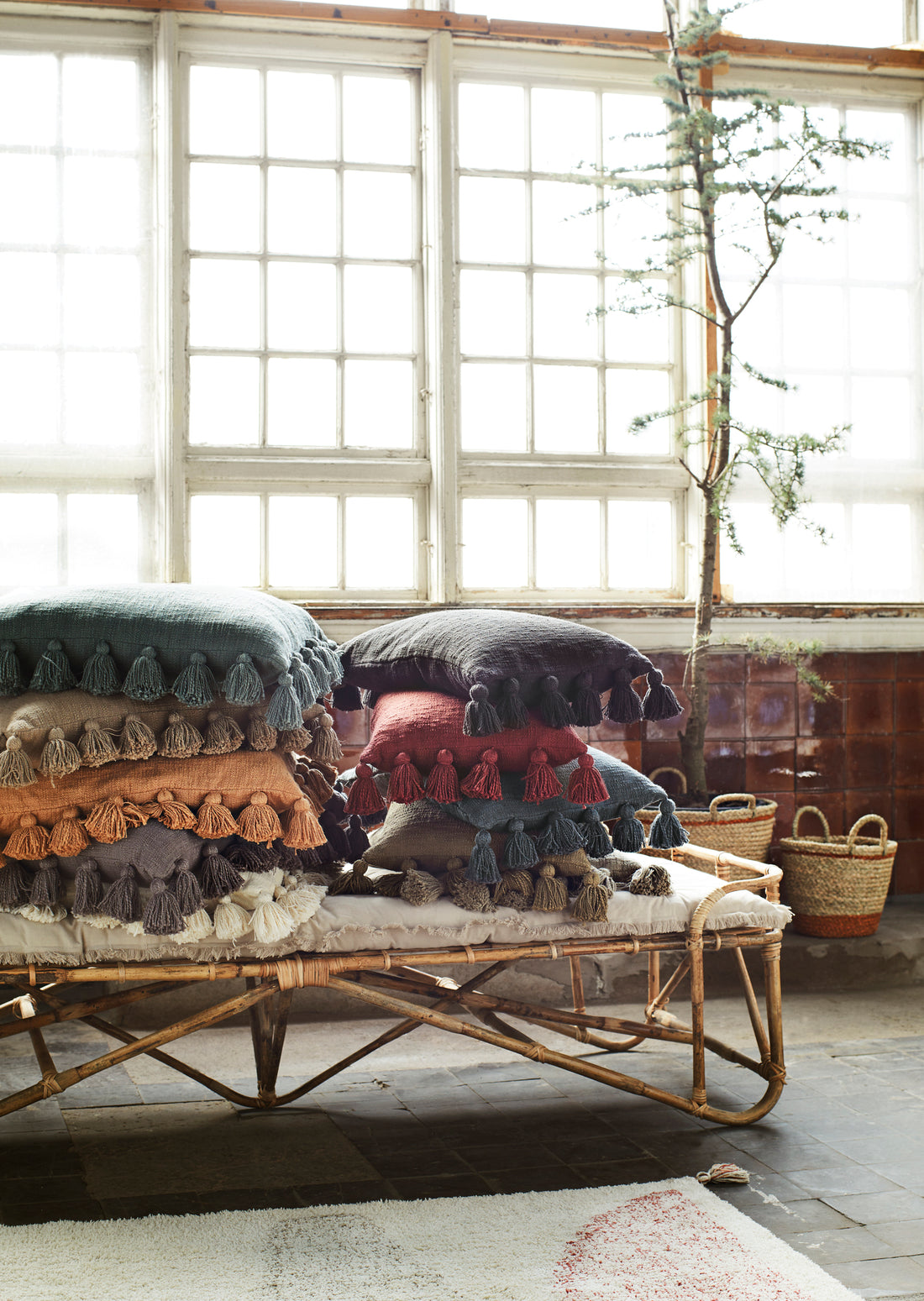 Housse de coussin pompons